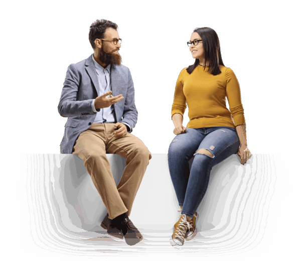 Mężczyzna z brodą w okularach rozmawiający z kobietą w okularach